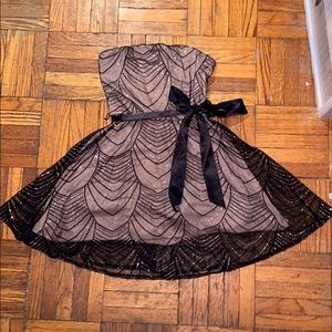 Strapless sparkly blush and black party dress
